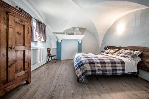 Postel nebo postele na pokoji v ubytování Agriturismo Rivet d'Or