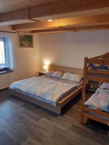 Postel nebo postele na pokoji v ubytování Apartmány Roudnice