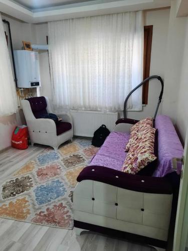 a bedroom with a bed and a couch and a chair at Private Room in Istanbul #9 in Istanbul