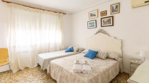 A bed or beds in a room at Chalet Brillante Córdoba by Ruralidays