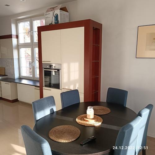Kuchyňa alebo kuchynka v ubytovaní Apartament Długa 35