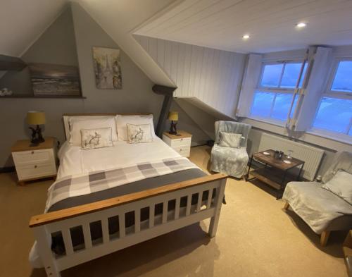 En eller flere senger på et rom på The Foulsyke Licensed Bed and Breakfast Scalby Scarborough