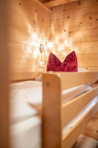 Una cama o camas en una habitación de The Kaprun Edition - Luxury Chalets & Style Suites