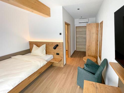 Кровать или кровати в номере Hotel Olympica