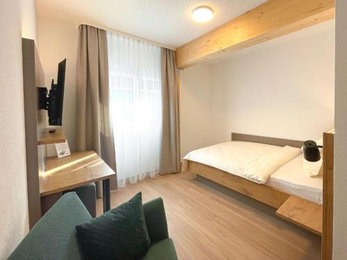 Кровать или кровати в номере Hotel Olympica