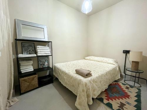 Cama o camas de una habitación en Apartamento Málaga Centro Tritón