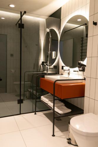 Koupelna v ubytování HVOYA Apart-Hotel & SPA