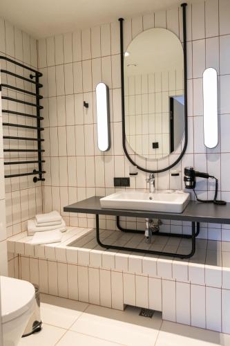 Koupelna v ubytování HVOYA Apart-Hotel & SPA