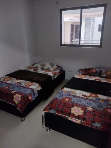 Cama o camas de una habitación en Acogedor apartamento Barrancabermeja