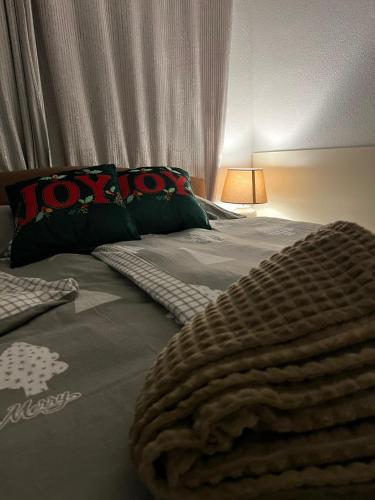 Postel nebo postele na pokoji v ubytování Apartmani Sollei