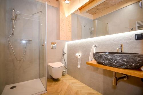 a bathroom with a sink and a shower at Gościniec u Bobaków in Ząb