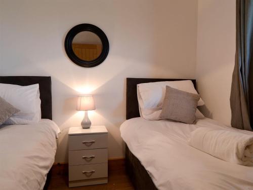 Ένα ή περισσότερα κρεβάτια σε δωμάτιο στο Offas Dyke Lodge - Uk10835