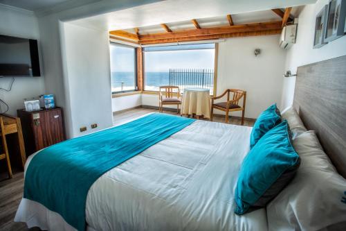 Cama o camas de una habitación en Hotel Oceanic