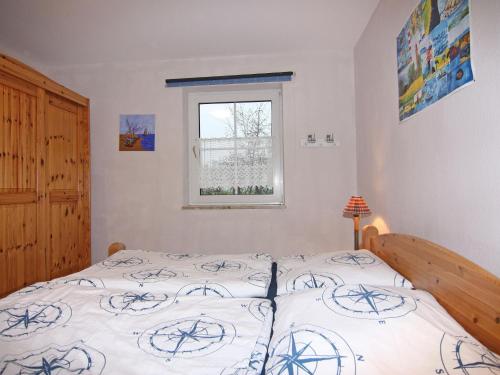 Säng eller sängar i ett rum på Holiday resort Petersdorf, Fehmarn-Petersdorf