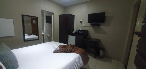 Een bed of bedden in een kamer bij Brando bnb