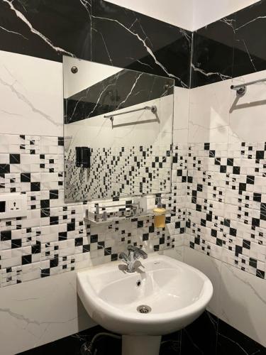 Koupelna v ubytování Hotel Adinova