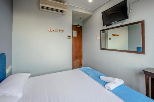 Postel nebo postele na pokoji v ubytování K Hotel 1515