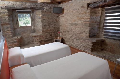 Postel nebo postele na pokoji v ubytování Albergue Turistico Salceda