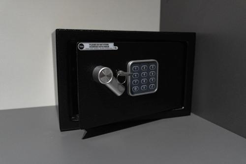 a black box with a remote control in it at ZOE LUXURY SUITES in Catania