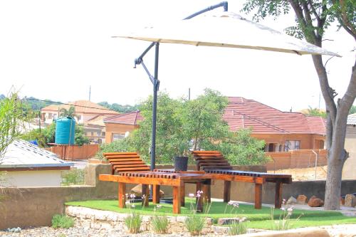 Κήπος έξω από το BEULAH GROUP BnB