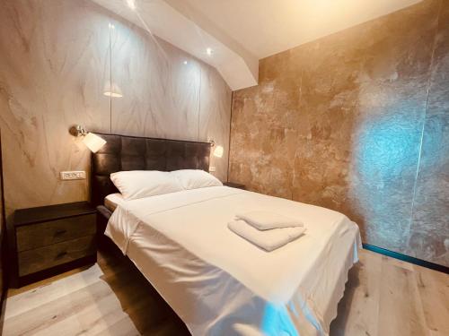 Postel nebo postele na pokoji v ubytování C Tower Apartments