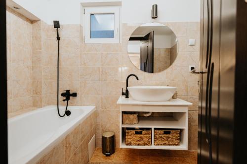 Koupelna v ubytování DOUX Apartman