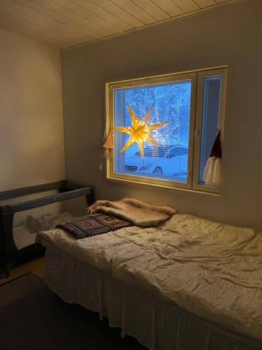 Postel nebo postele na pokoji v ubytování Villa Norvasalmi