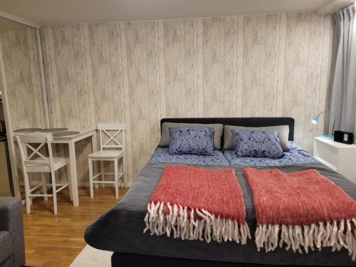Postel nebo postele na pokoji v ubytování Harjulake Apartment Rovaniemi