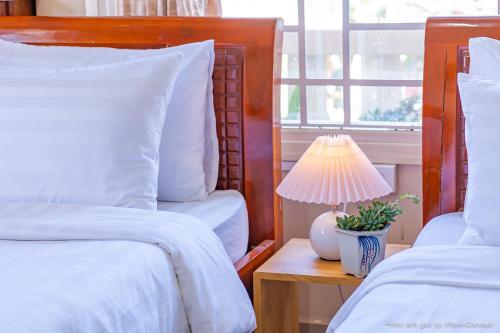 Letto o letti in una camera di Lam Vien Garden Villa - Homestay Da Lat