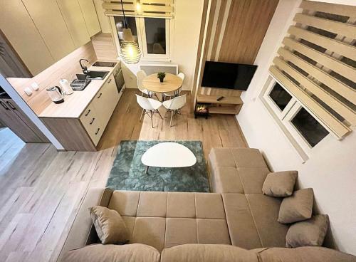 an overhead view of a living room with a couch at Mons Apartments Jahorina in Jahorina