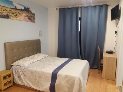 Postel nebo postele na pokoji v ubytování LPA PEREIRA Hotel restaurante