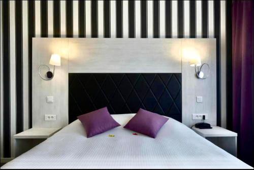 Säng eller sängar i ett rum på Auberge de l'Etoile