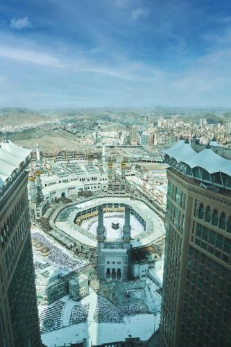 an aerial view of a city in the snow at Makkah Clock Royal Tower, A Fairmont Hotel in Makkah