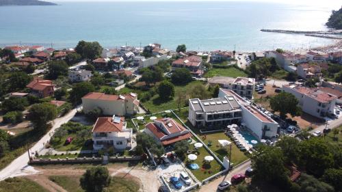 an aerial view of a city with the ocean at Harmony Studios & Apartments in Skala Potamias