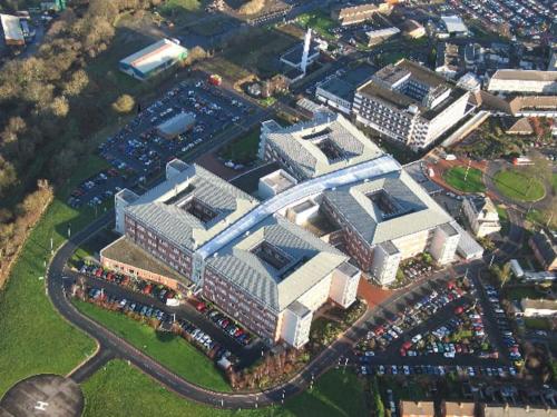 an overhead view of a building with a parking lot at Luxury House Near City Center Hospital &Superstore in Carlisle