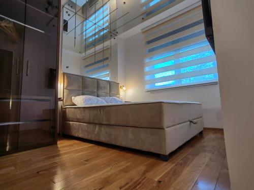 Ένα ή περισσότερα κρεβάτια σε δωμάτιο στο Titova vila Istra apartman Jovanka