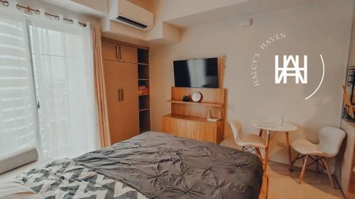 Katil atau katil-katil dalam bilik di Halcy’s Haven, Studio Condo at the Heart of Davao