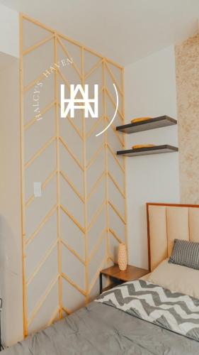 Katil atau katil-katil dalam bilik di Halcy’s Haven, Studio Condo at the Heart of Davao