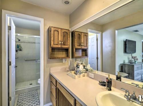 a bathroom with a sink and a mirror at Vacation Home 4 Bedrooms 3Baths 10 beds home in Melbourne