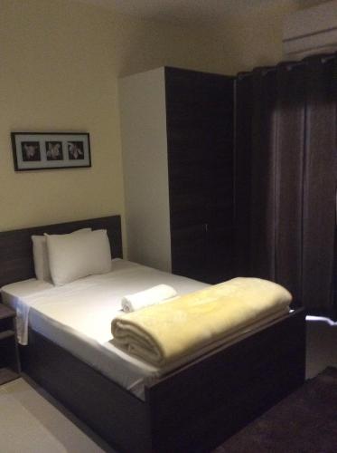Cama o camas de una habitación en Sakan 275