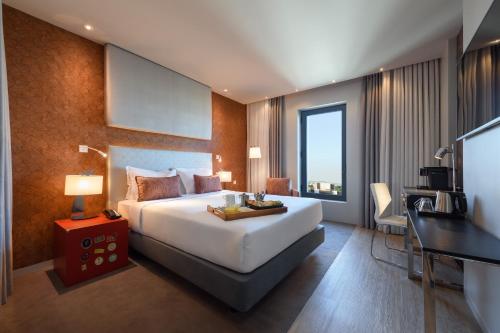 Katil atau katil-katil dalam bilik di Meliá Lisboa Aeroporto