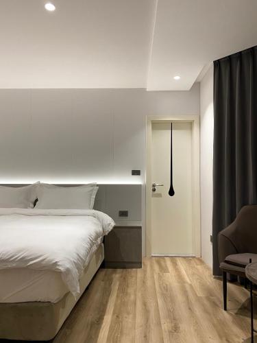 Cama o camas de una habitación en Chapter 127