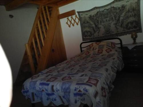 Letto o letti in una camera di TRADITIONAL HOUSE
