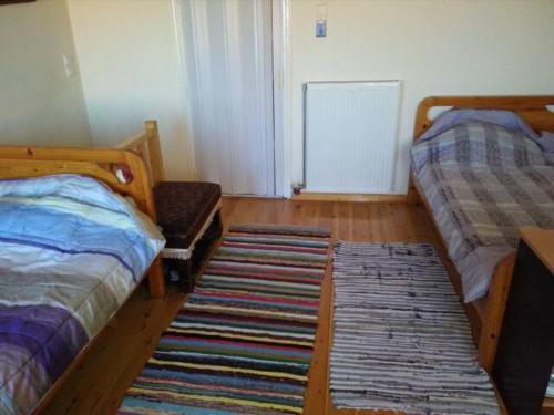 Letto o letti in una camera di TRADITIONAL HOUSE