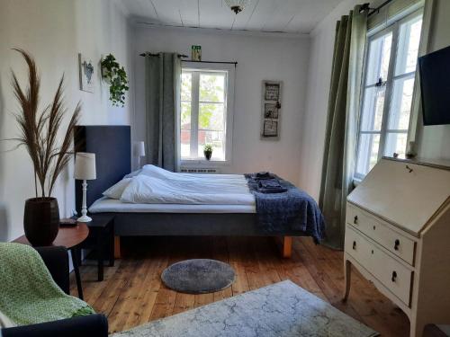 Säng eller sängar i ett rum på KvarnDammens Bed & Breakfast
