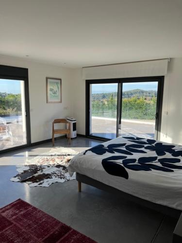 Ένα ή περισσότερα κρεβάτια σε δωμάτιο στο Villa Design