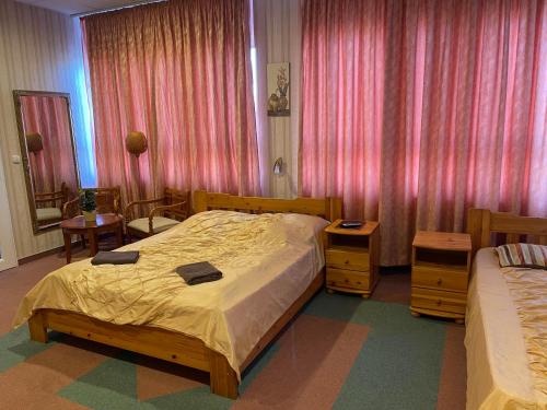Letto o letti in una camera di Airport Szálló