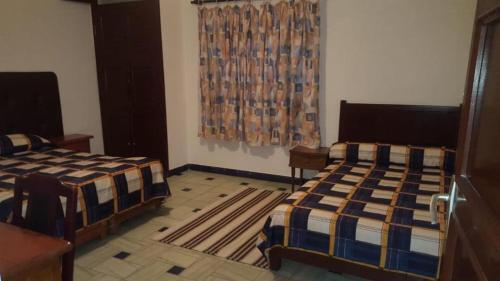 Postel nebo postele na pokoji v ubytování Residence Mediterranee
