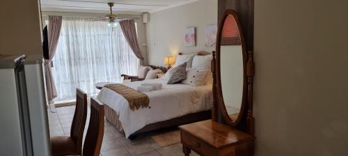 Ένα ή περισσότερα κρεβάτια σε δωμάτιο στο Private Guest Suite with 24hr Electricity, East London