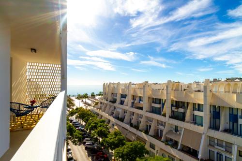 - une vue depuis le balcon d'un bâtiment dans l'établissement MARBELLA BANUS SUITES - Marbella Centre Sea Views Suite Apartment, à Marbella